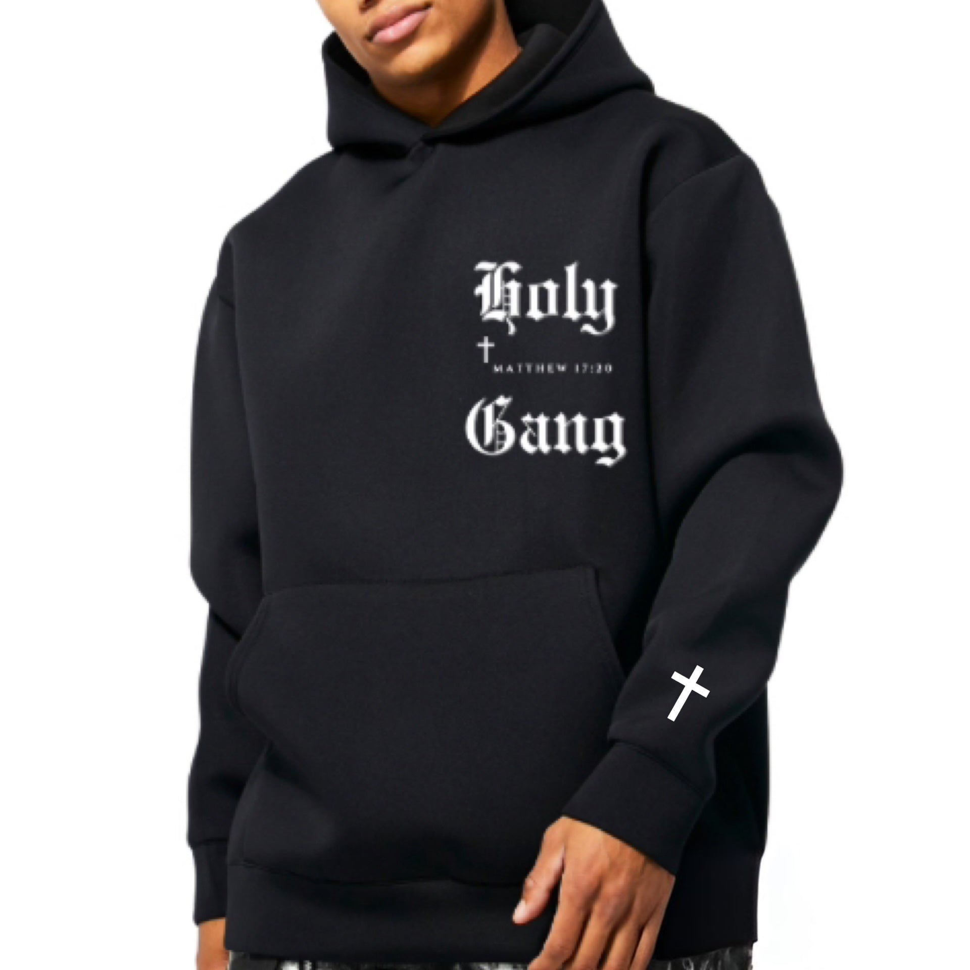Front view of black Holy Gang hoodie featuring white gothic logo, cross detail on sleeve, and Bible verse Matthew 17:20.
